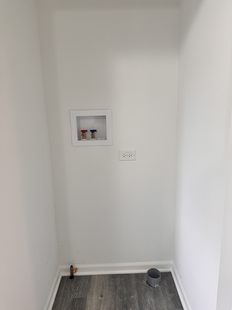 248 North State Street Franklin Grove, IL 61031 - Photo 23 of 26 a view of a small space with wooden floor