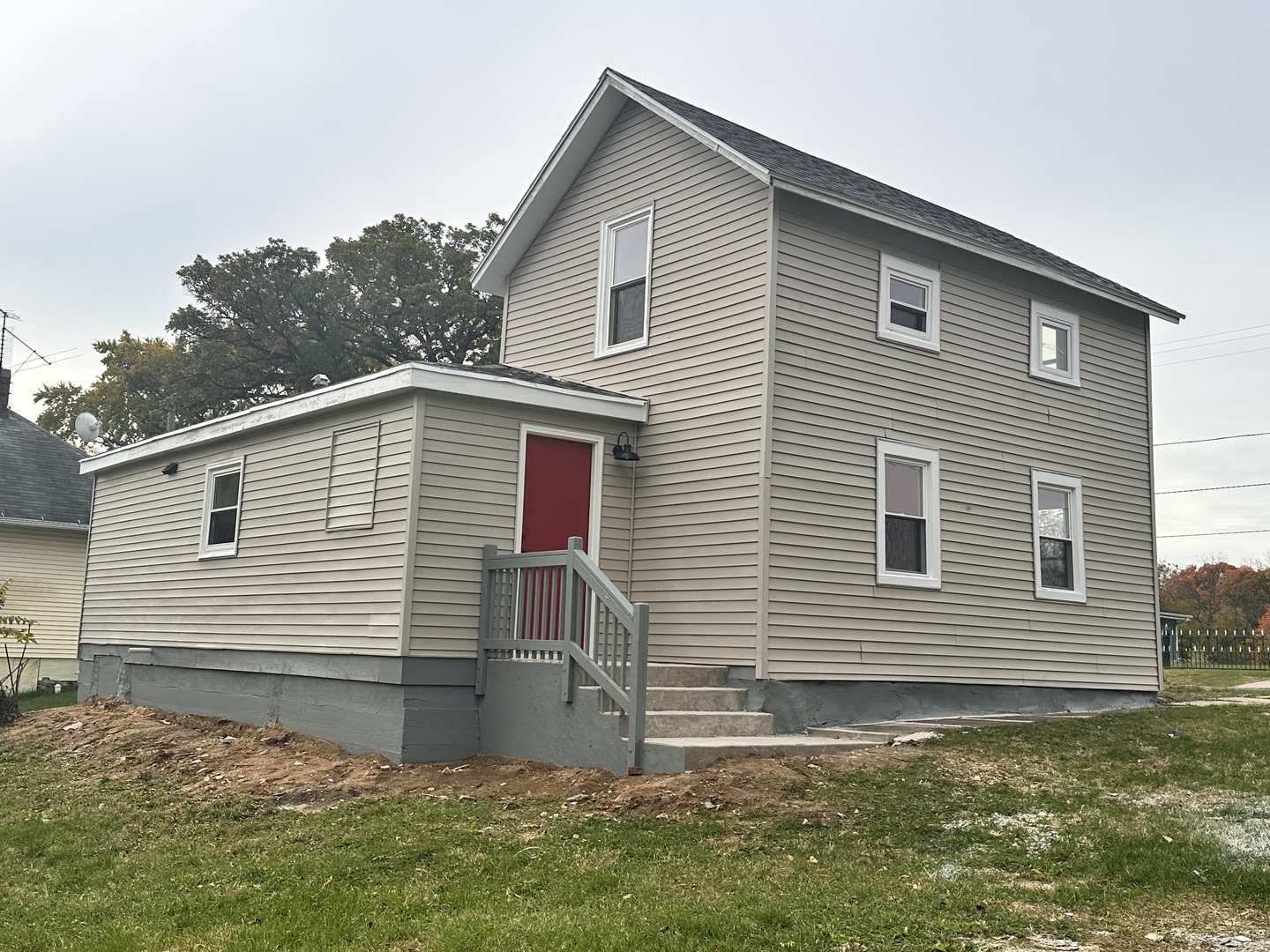 248 North State Street Franklin Grove, IL 61031 - Photo 4 of 26 a view of a house with a yard