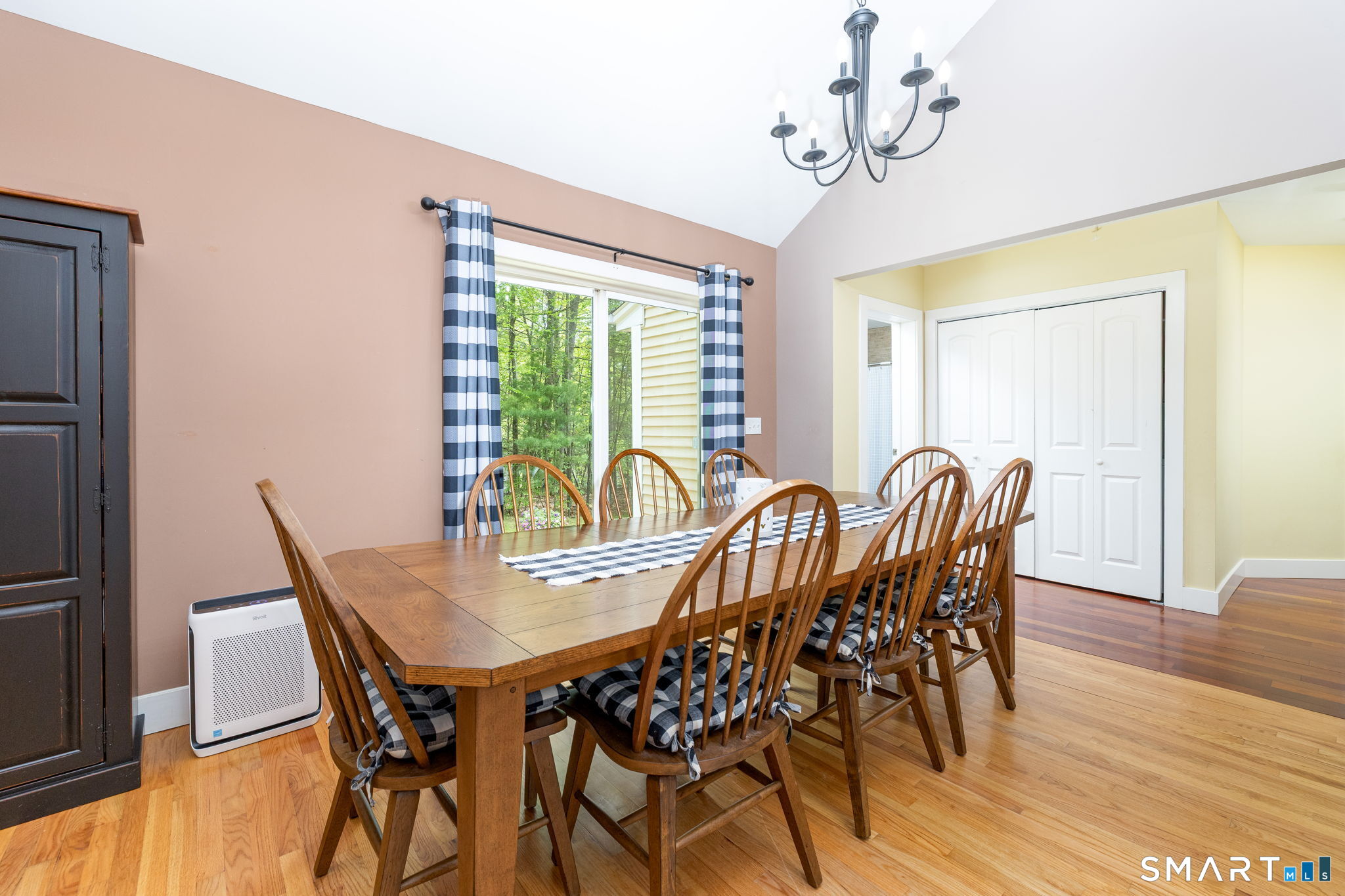 29 Old Simsbury Road Granby, CT 06035 - Photo 34 of 34 This open floor plan kitchen/dining leads to the sliders that open out onto the deck.