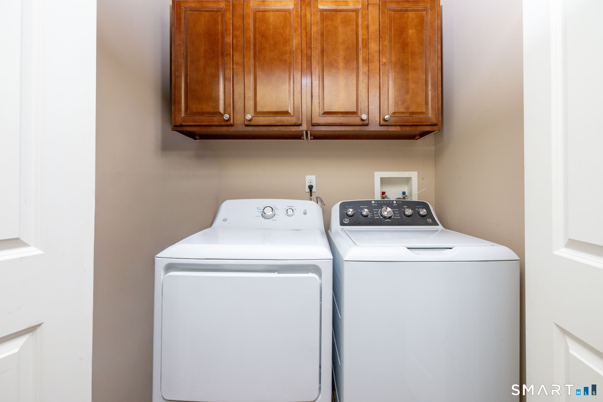 29 Old Simsbury Road Granby, CT 06035 - Photo 21 of 34 Laundry is on the main level behind doors in the hall near the bathroom.