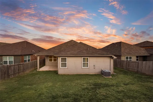 a view of a house with a garden