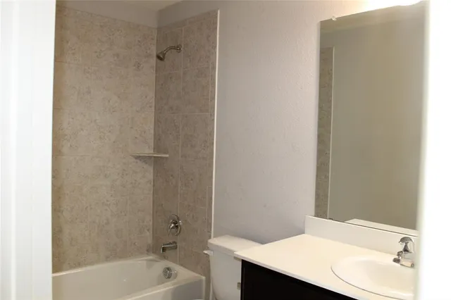 a bathroom with a sink and a bathtub