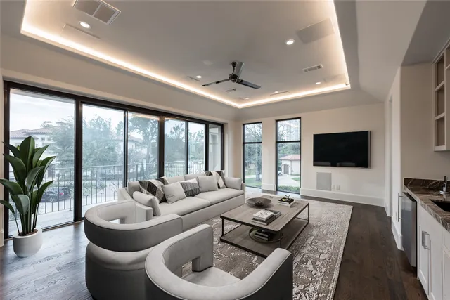 a bathroom with a double vanity sink toilet and shower