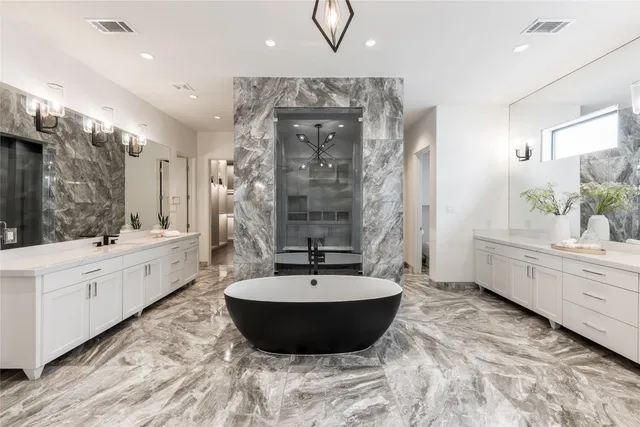 a view of a house with backyard sitting area and swimming pool