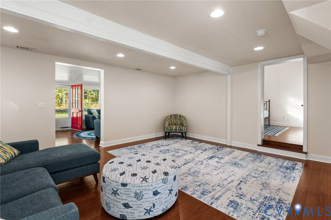 467 Blundon Road Reedville, VA 22539 - Photo 15 of 35 a bedroom with furniture and a window