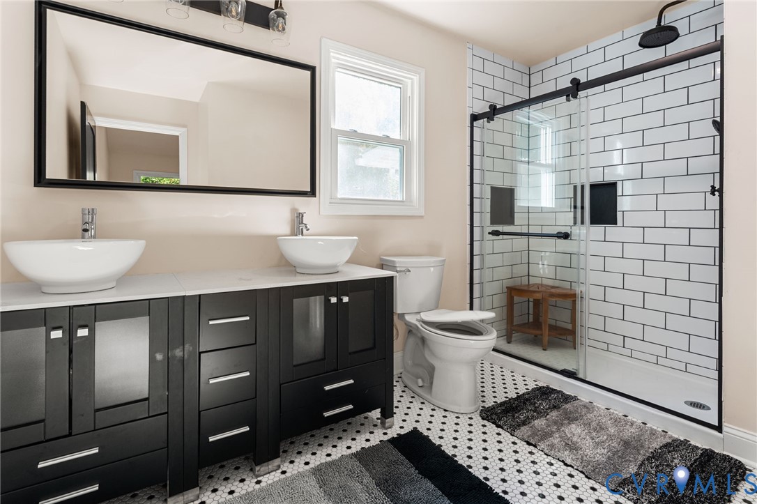 467 Blundon Road Reedville, VA 22539 - Photo 21 of 35 a bathroom with a sink toilet and mirror