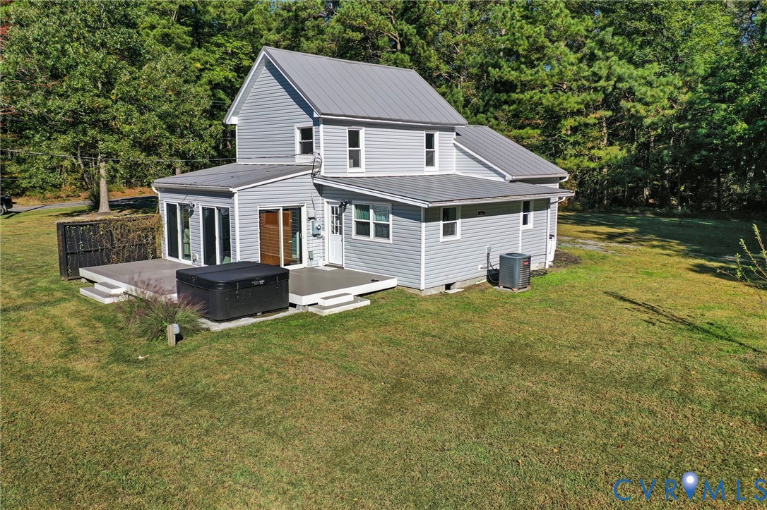 467 Blundon Road Reedville, VA 22539 - Photo 31 of 35 a front view of a house with yard and green space