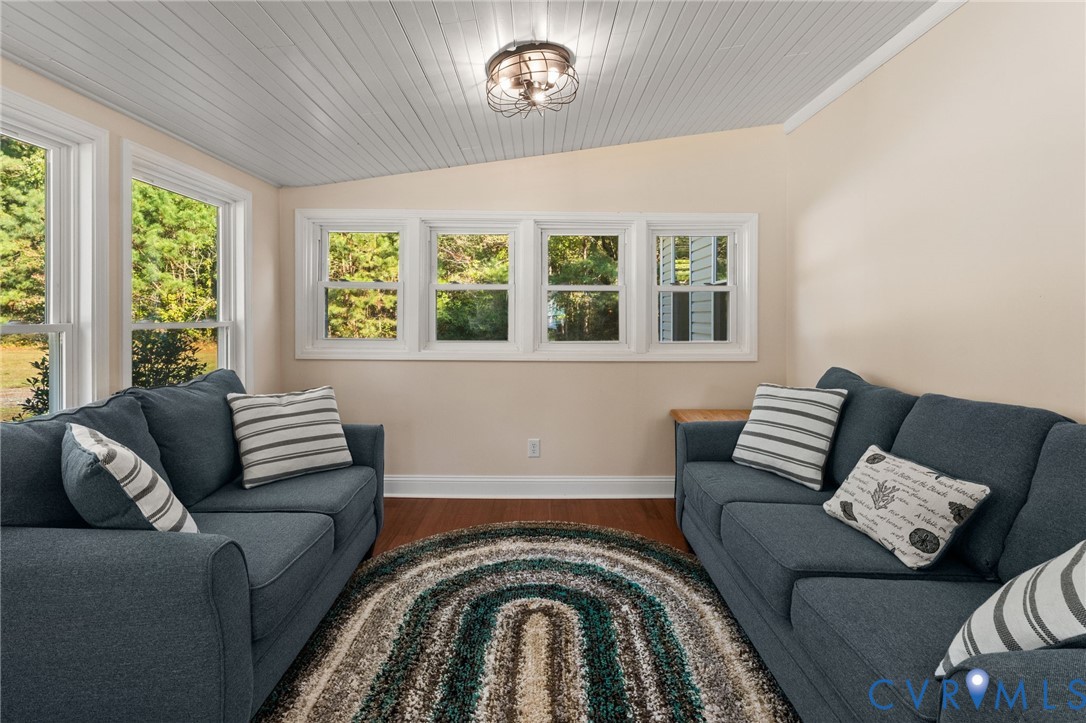467 Blundon Road Reedville, VA 22539 - Photo 6 of 35 a living room with furniture and a large window