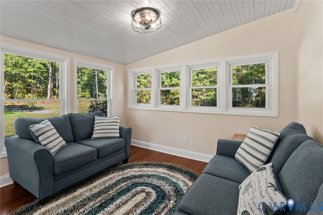 467 Blundon Road Reedville, VA 22539 - Photo 7 of 35 a living room with furniture and a large window