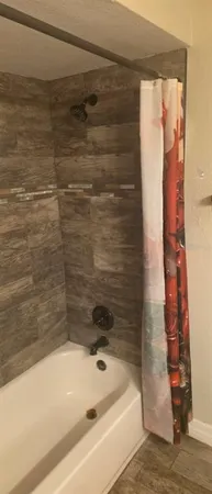 a bathroom with a bathtub