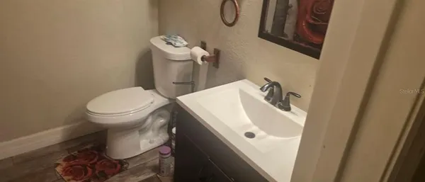 a bathroom with a sink and a toilet