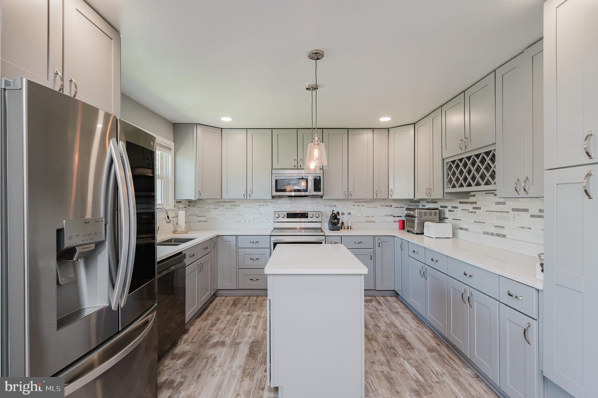 2222 Monocacy Road Essex, MD 21221 - Photo 6 of 70 Sleek modern kitchen with elegant finishes.