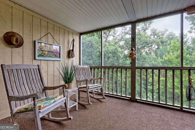 a view of walk in closet with clothes