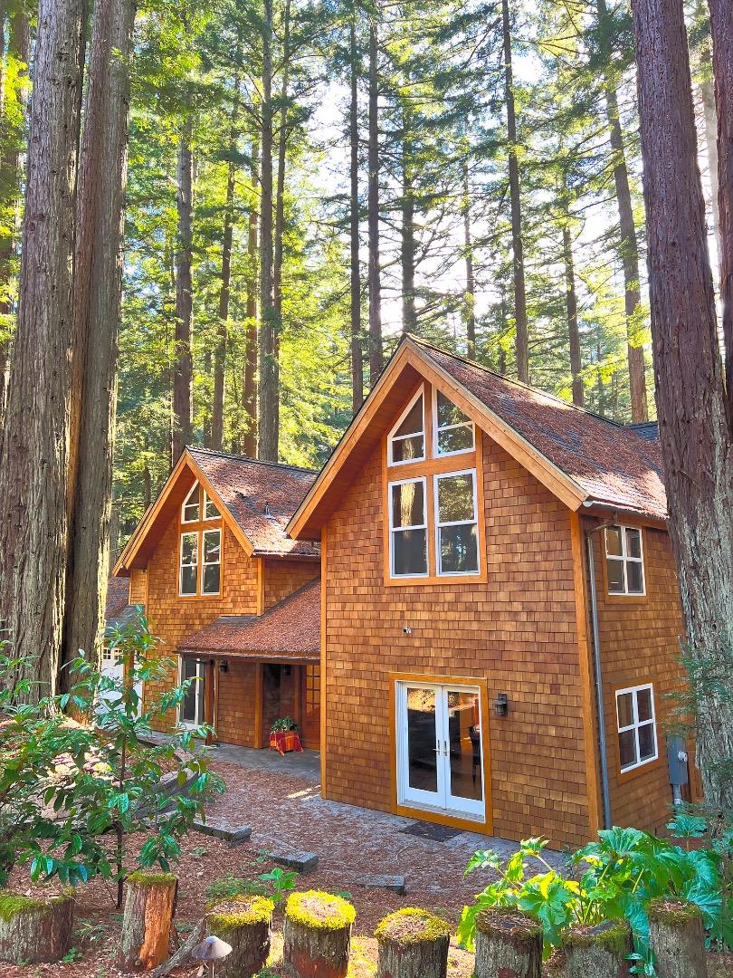 13370 Skyline Boulevard Woodside, CA 94062 - Photo 2 of 3 a front view of a house with a yard