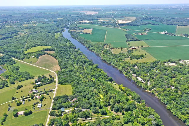 a view of a backyard of the house