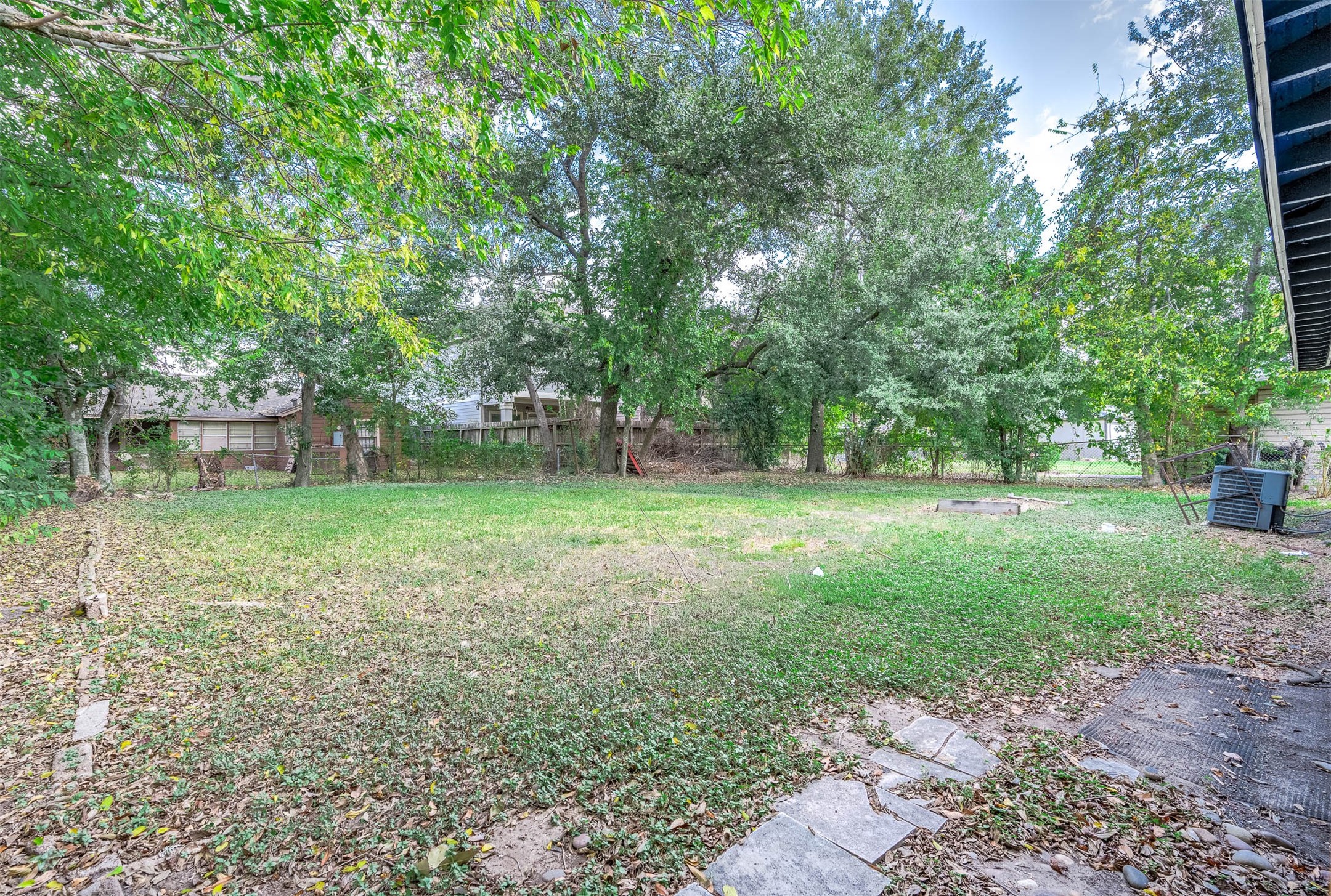 3723 Odin Court Houston, TX 77021 - Photo 17 of 19 a backyard of a house with lots of green space