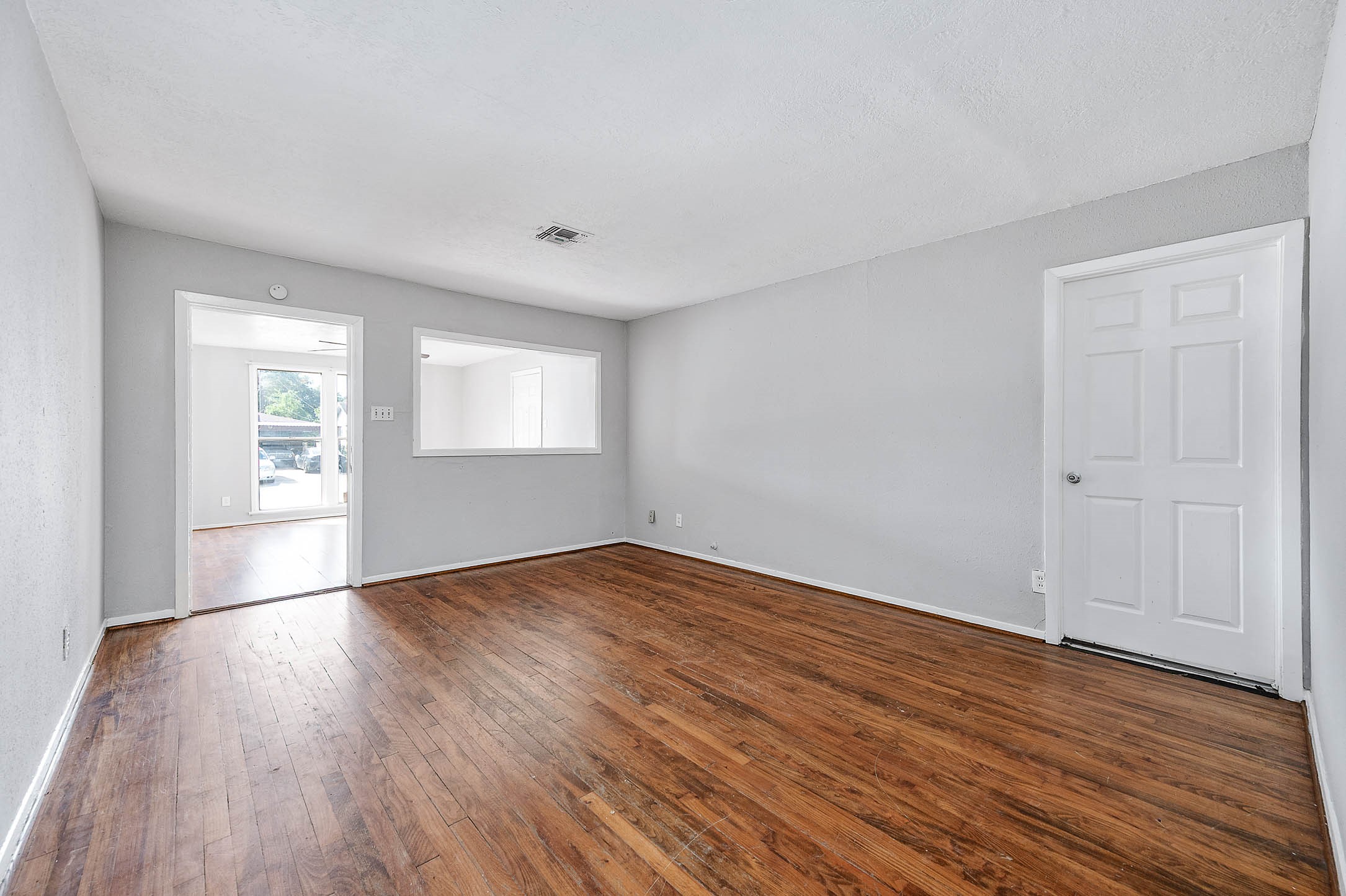 3723 Odin Court Houston, TX 77021 - Photo 5 of 19 a view of empty room with wooden floor and fan