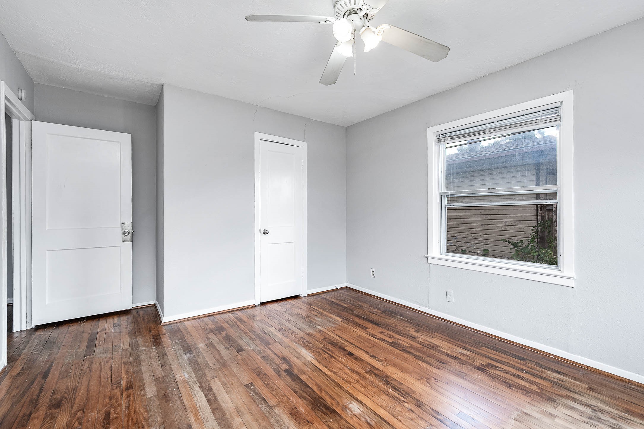 3723 Odin Court Houston, TX 77021 - Photo 9 of 19 a view of empty room with wooden floor and fan