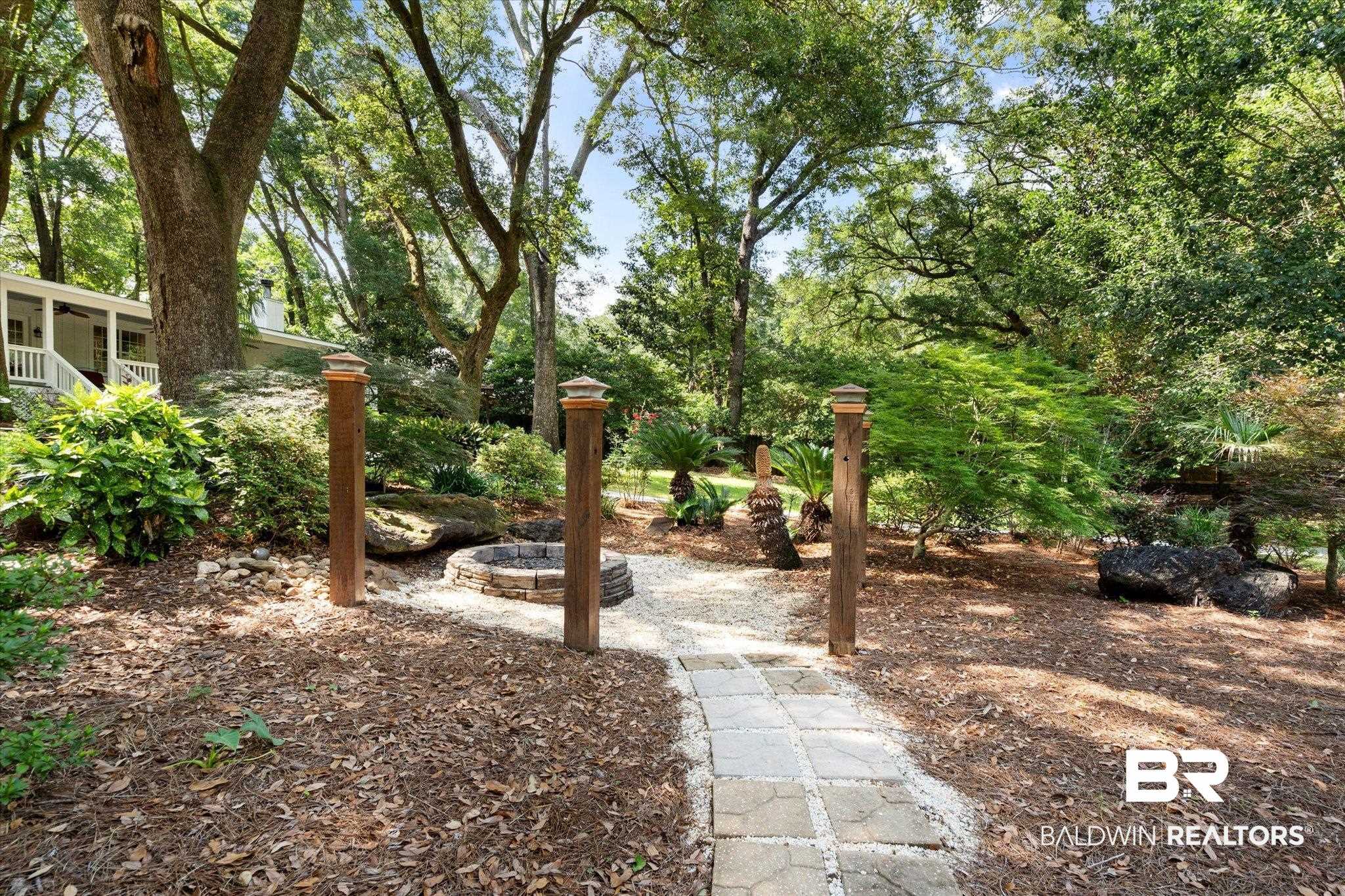 3715 Latigo Road Mobile, AL 36695 - Photo 26 of 39 View of yard with a fire pit