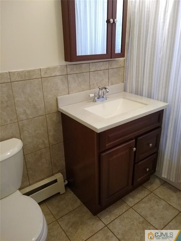 29 Richmond Road Edison, NJ 08817 - Photo 13 of 31 a bathroom with a sink vanity and toilet