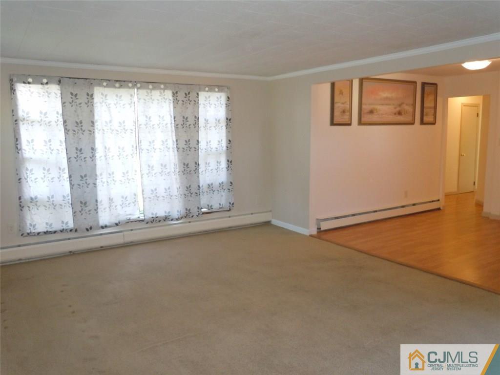 29 Richmond Road Edison, NJ 08817 - Photo 16 of 31 a view of an empty room with a window
