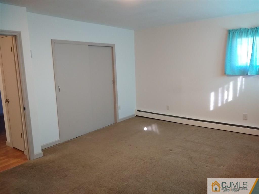29 Richmond Road Edison, NJ 08817 - Photo 20 of 31 an empty room with windows
