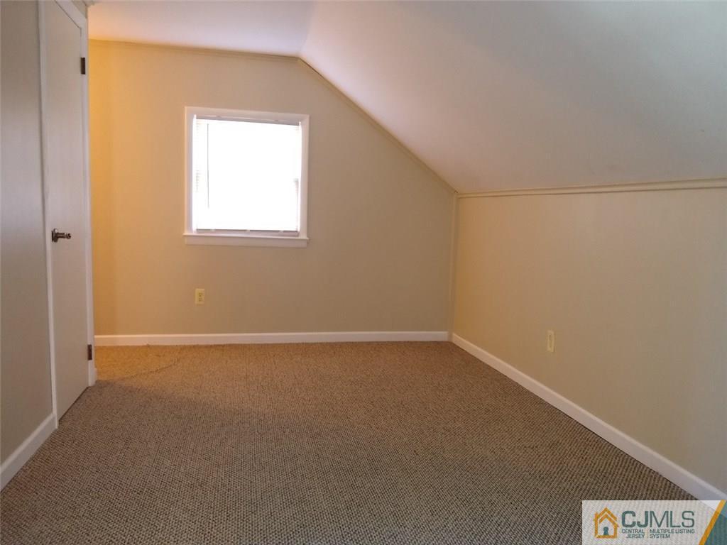 29 Richmond Road Edison, NJ 08817 - Photo 24 of 31 a view of an empty room with a window