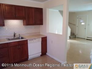 29 Richmond Road Edison, NJ 08817 - Photo 10 of 31 a kitchen with a sink and cabinets