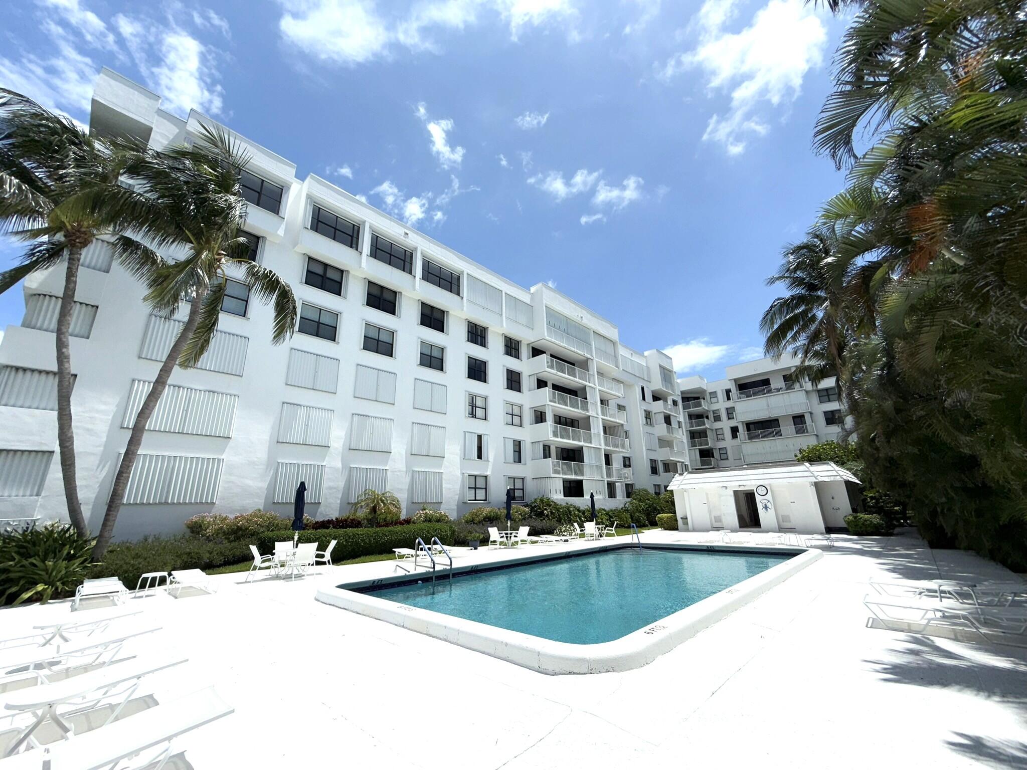 2860 South Ocean Boulevard, Unit 415 Palm Beach, FL 33480 - Photo 24 of 24 a view of a swimming pool with a patio
