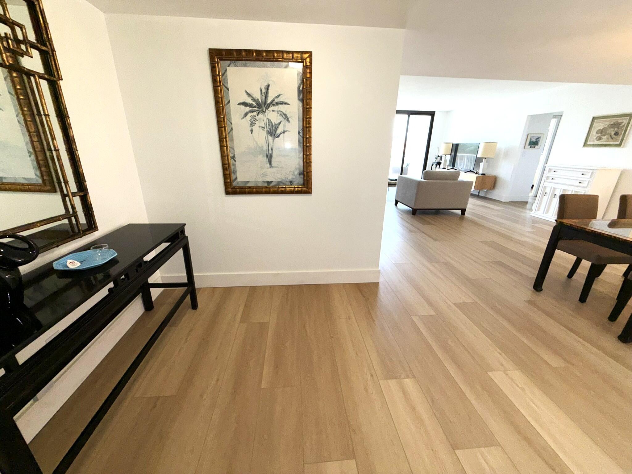 2860 South Ocean Boulevard, Unit 415 Palm Beach, FL 33480 - Photo 5 of 24 a view of a living room and dining room