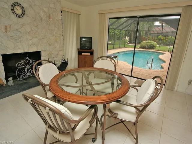 a table and chairs in a room