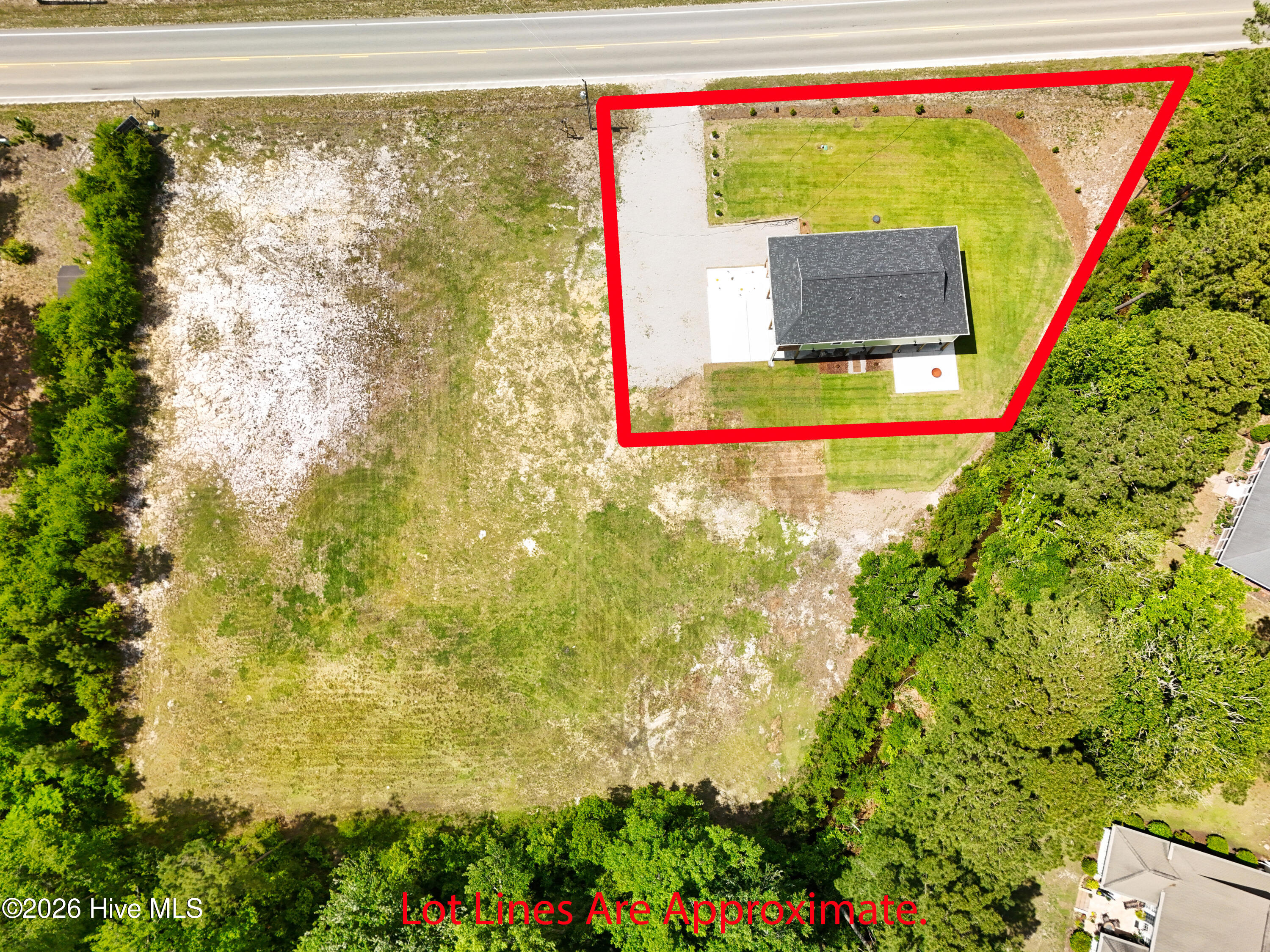 8238 Old Georgetown Road Southwest Sunset Beach, NC 28468 - Photo 5 of 69 There are two other parcels next to the home that do not convey with this home. The property is outlined in red.
