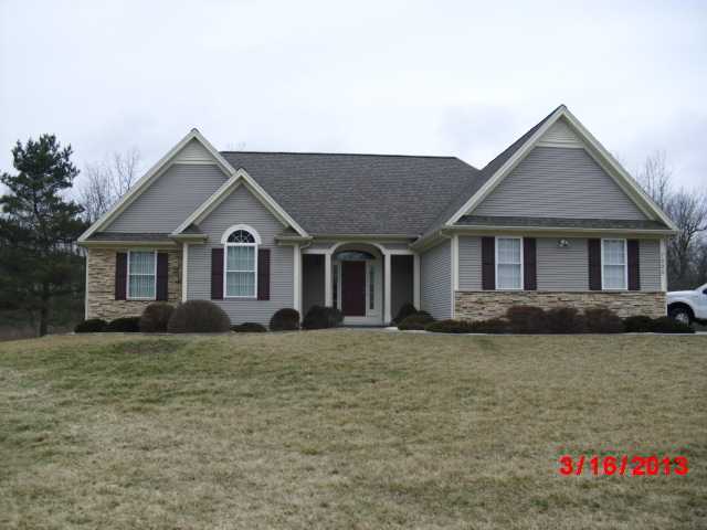 7925 West Henrietta Road Rush, NY 14543 - Photo 1 of 1 Exterior Front Stunning custom built ranch fully l
