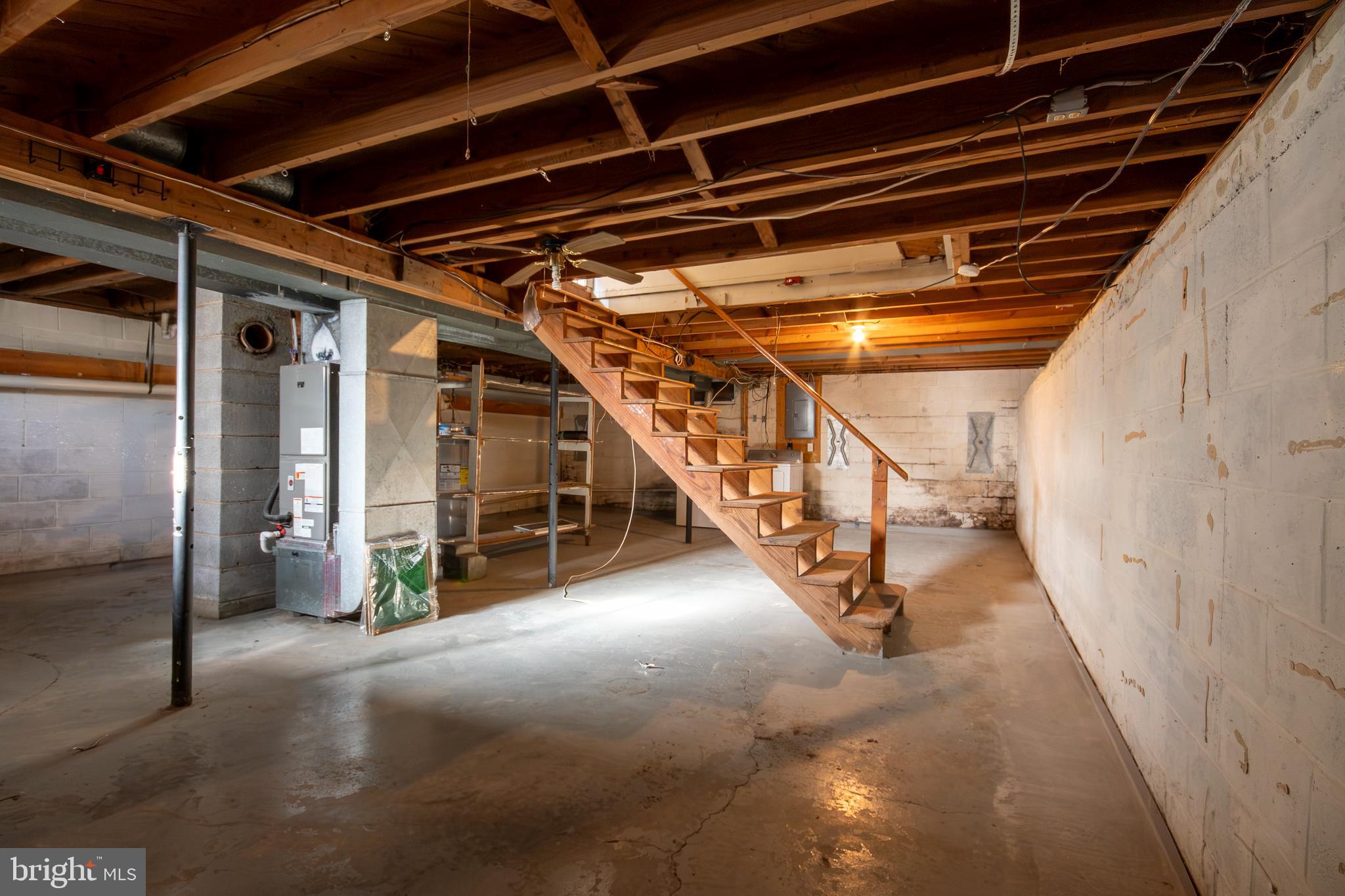 219 Virginia Street Strasburg, VA 22657 - Photo 14 of 29 a view of an empty room with stairs