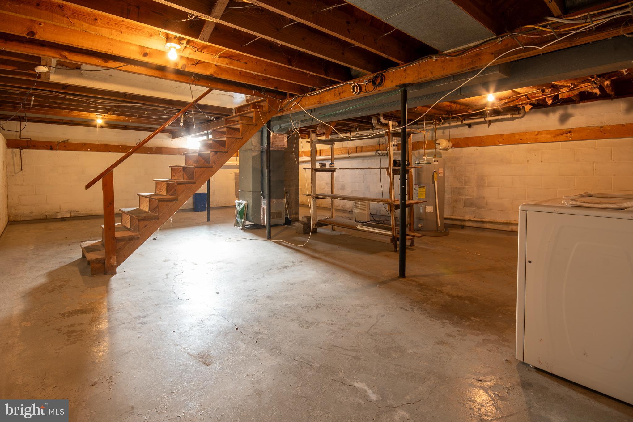 219 Virginia Street Strasburg, VA 22657 - Photo 18 of 29 a view of an empty room with wooden floor