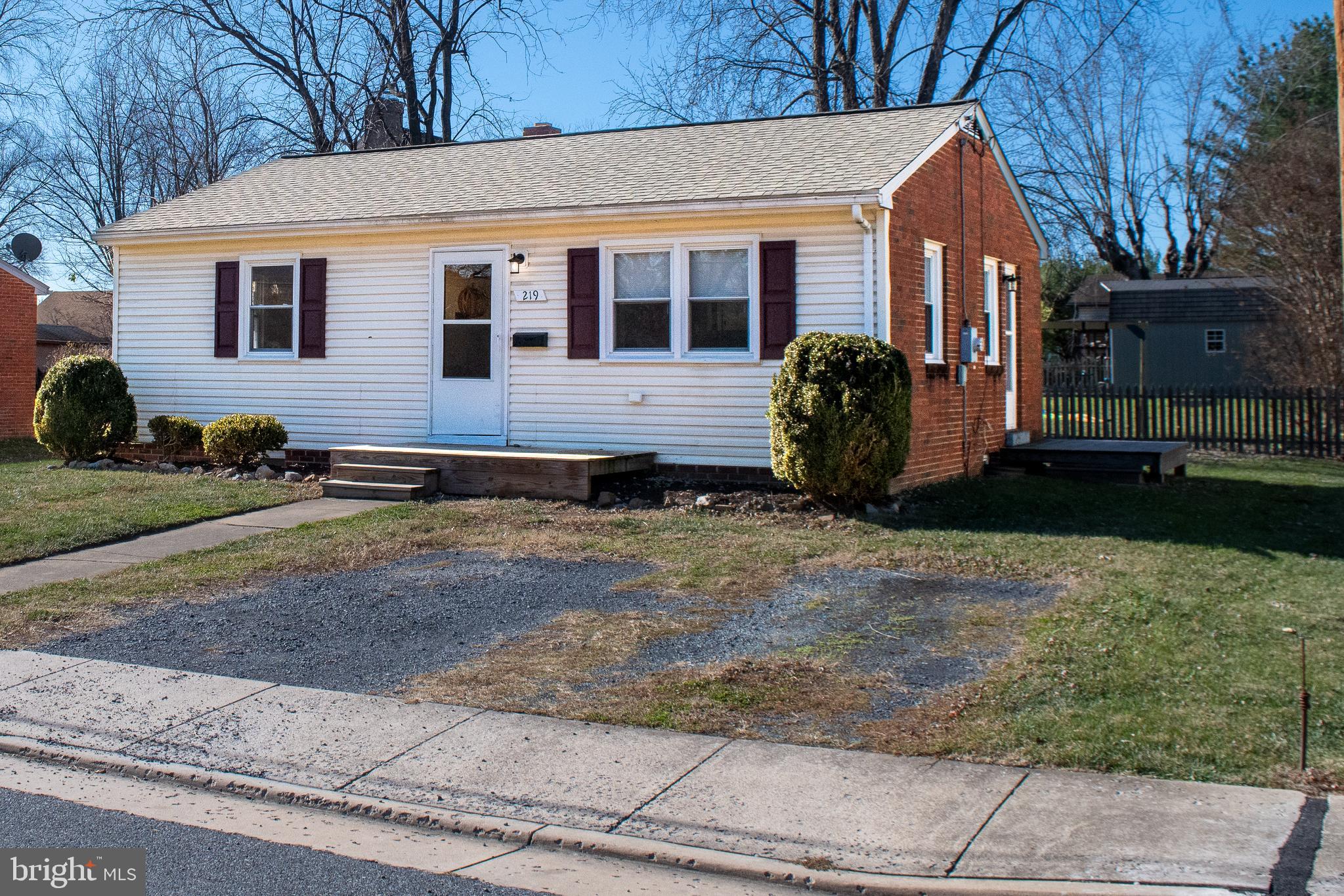 219 Virginia Street Strasburg, VA 22657 - Photo 21 of 29 a view of a house with backyard and trees