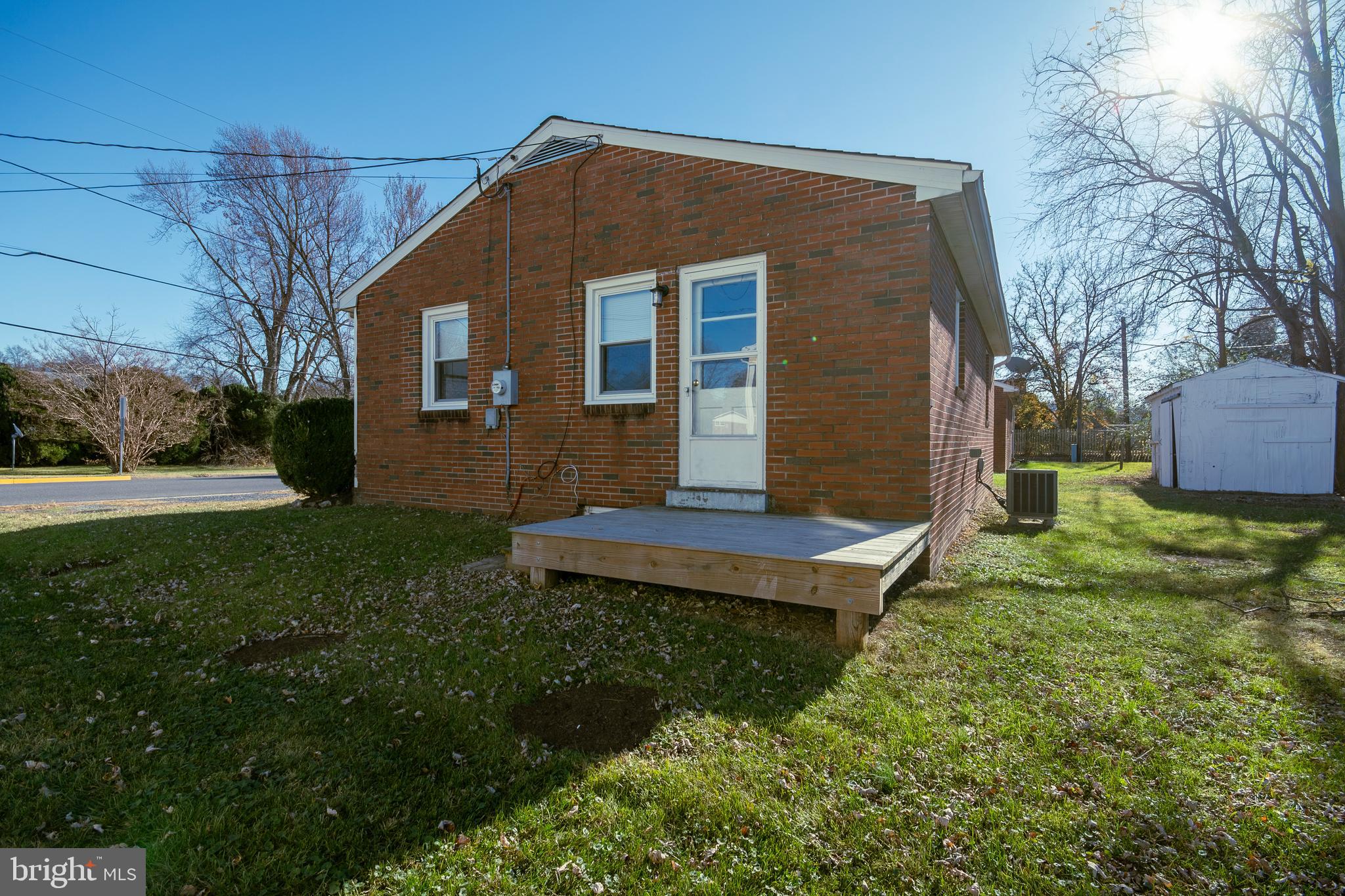 219 Virginia Street Strasburg, VA 22657 - Photo 26 of 29 a front view of a house with a yard