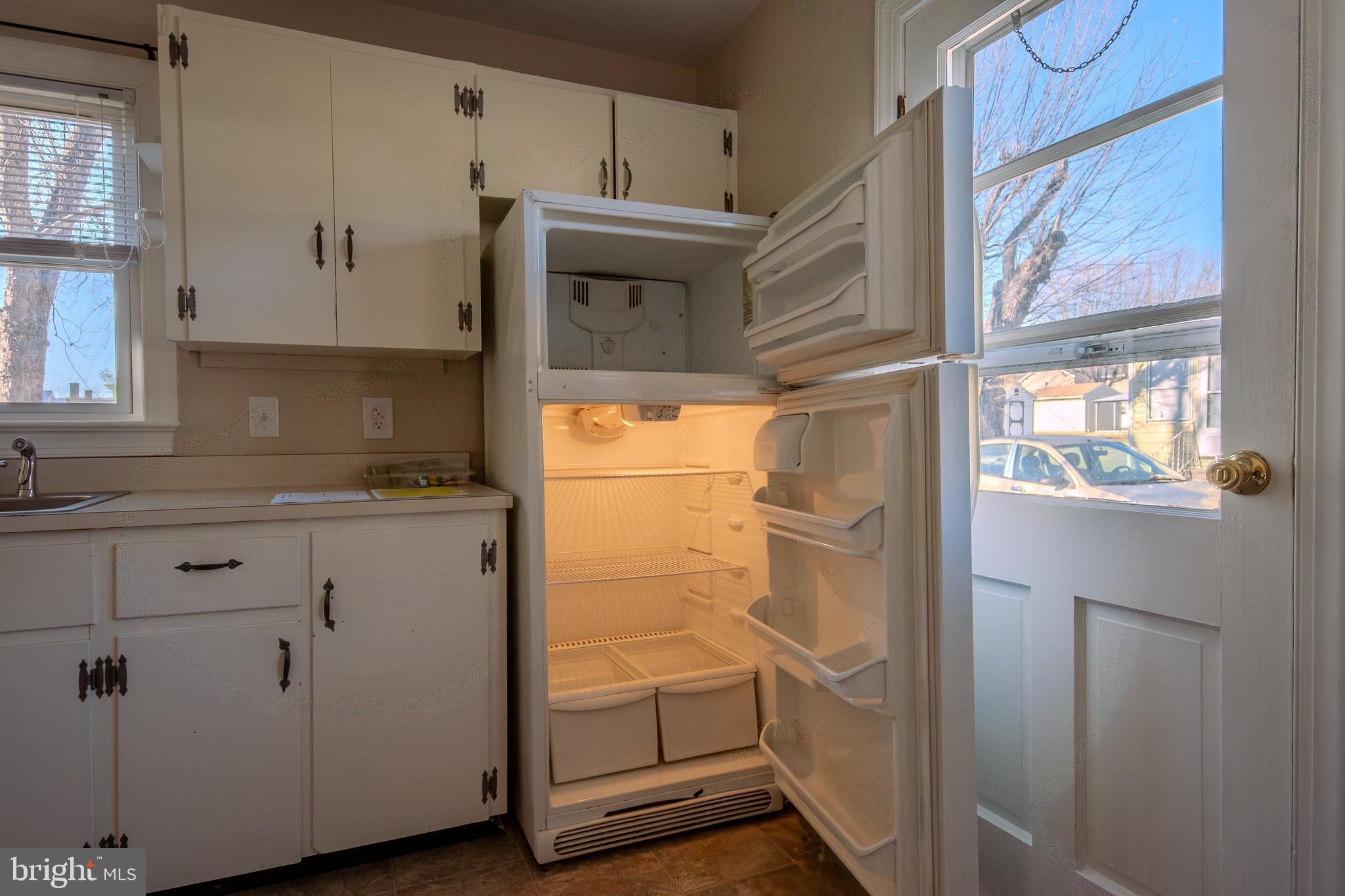 219 Virginia Street Strasburg, VA 22657 - Photo 7 of 29 a bathroom with a shower and a sink