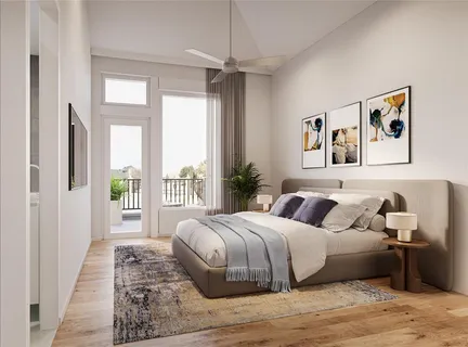 a bedroom with a large bed and a window