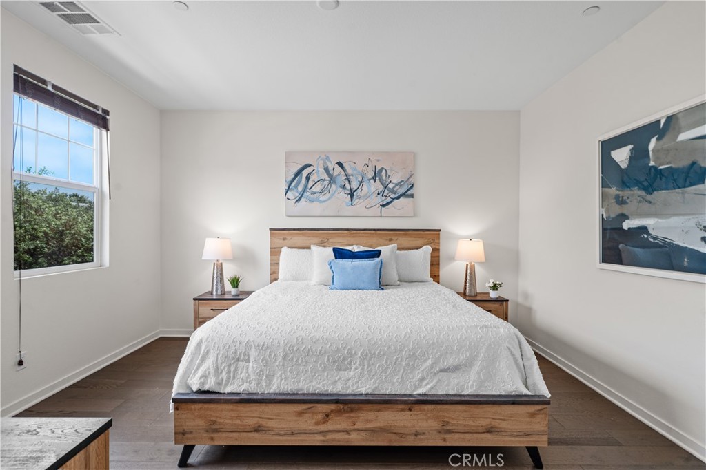 78 Patria Rancho Mission Viejo, CA 92694 - Photo 18 of 56 a bedroom with a bed and painting on the wall