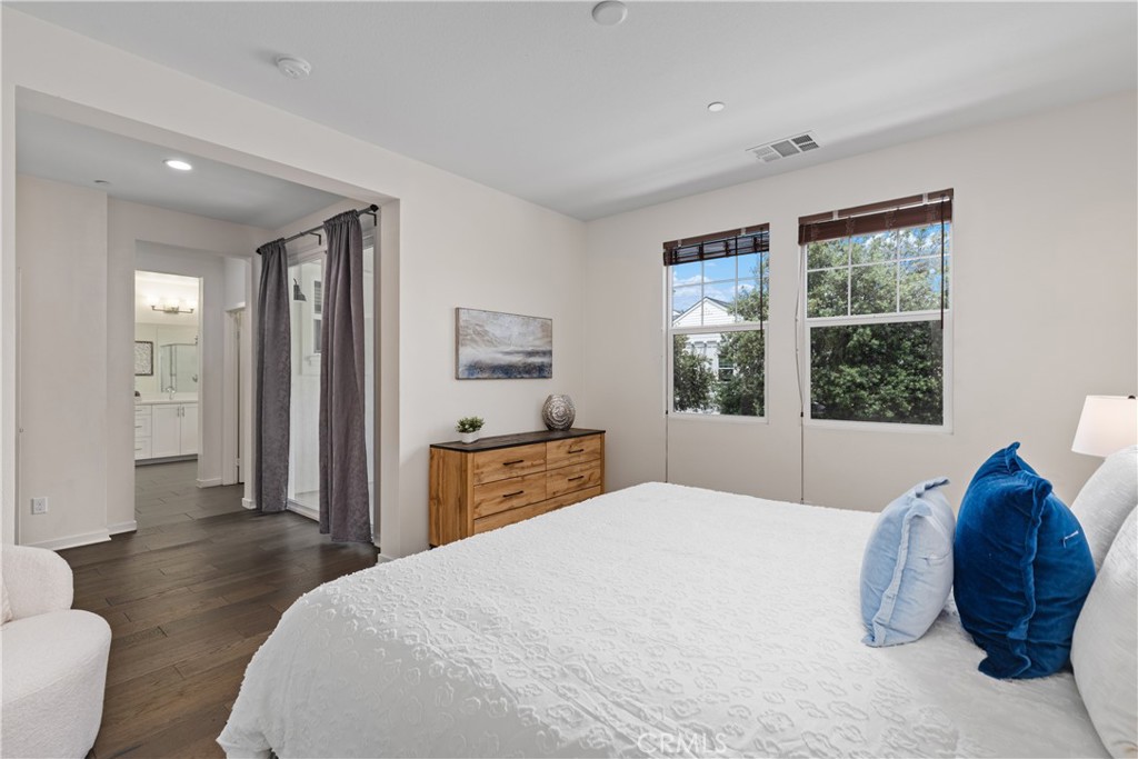 78 Patria Rancho Mission Viejo, CA 92694 - Photo 19 of 56 a bedroom with a large bed and a window