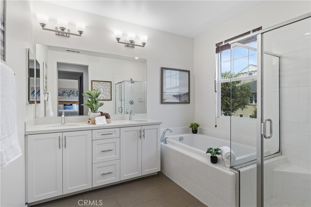 78 Patria Rancho Mission Viejo, CA 92694 - Photo 20 of 56 a bathroom with a sink a tub and a mirror