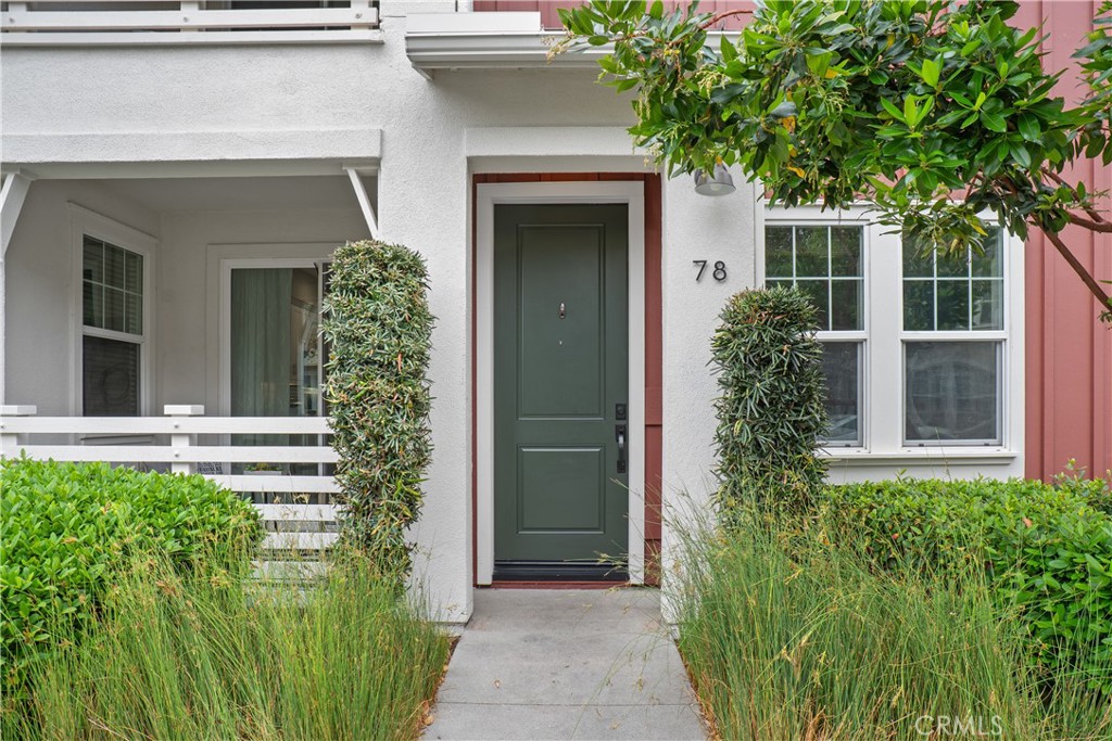 78 Patria Rancho Mission Viejo, CA 92694 - Photo 2 of 56 front view of a house with potted plants