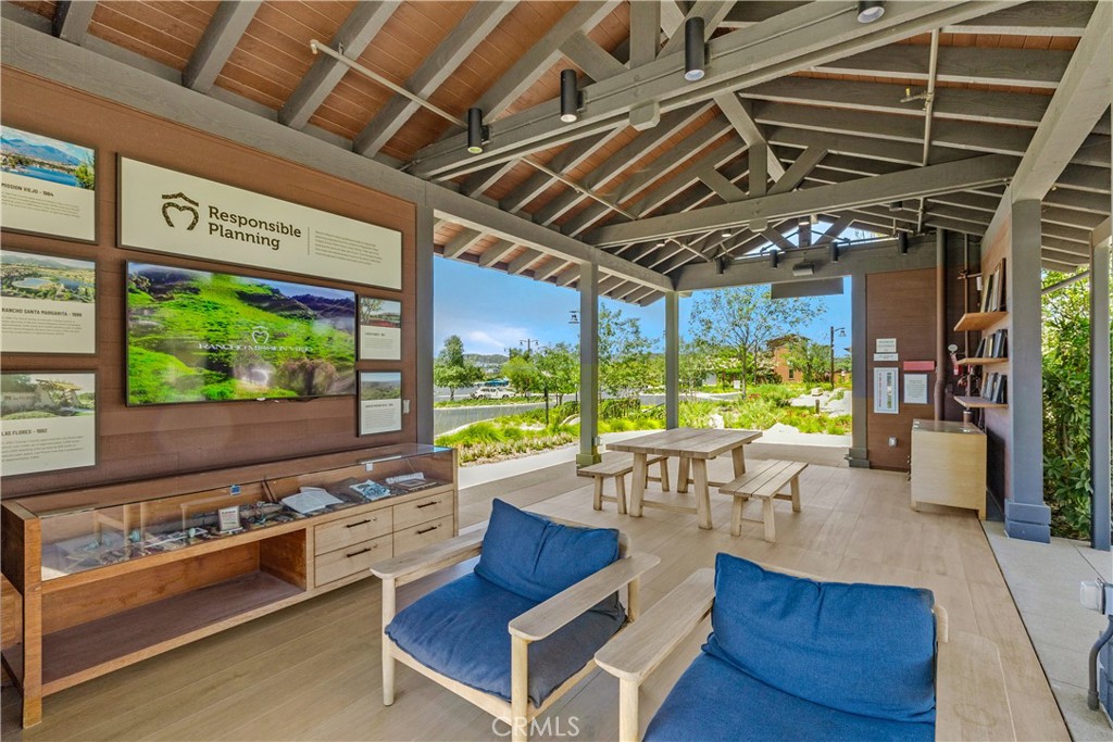 78 Patria Rancho Mission Viejo, CA 92694 - Photo 48 of 56 a living room with furniture stove and large windows