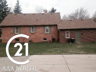 258 Capac Road Allenton, MI 48002 - Photo 14 of 21 back view of home