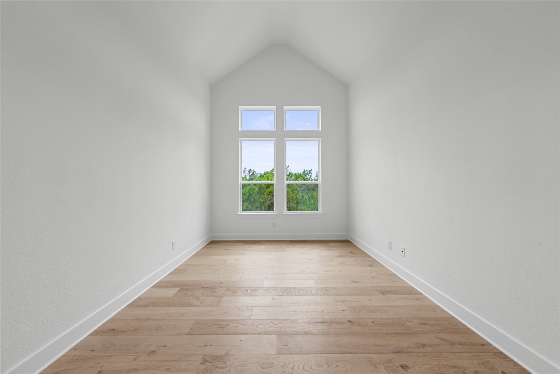 1304 Novara Trail Leander, TX 78641 - Photo 14 of 25 an empty room with windows
