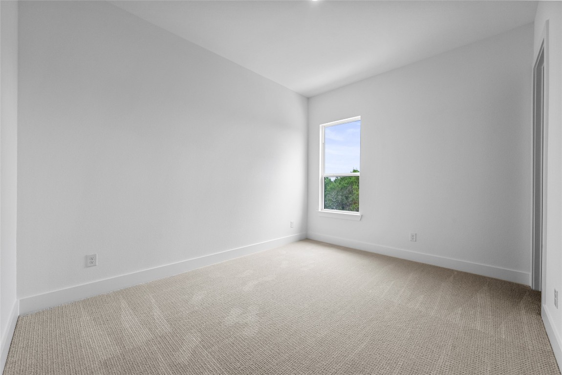 1304 Novara Trail Leander, TX 78641 - Photo 10 of 25 an empty room with windows