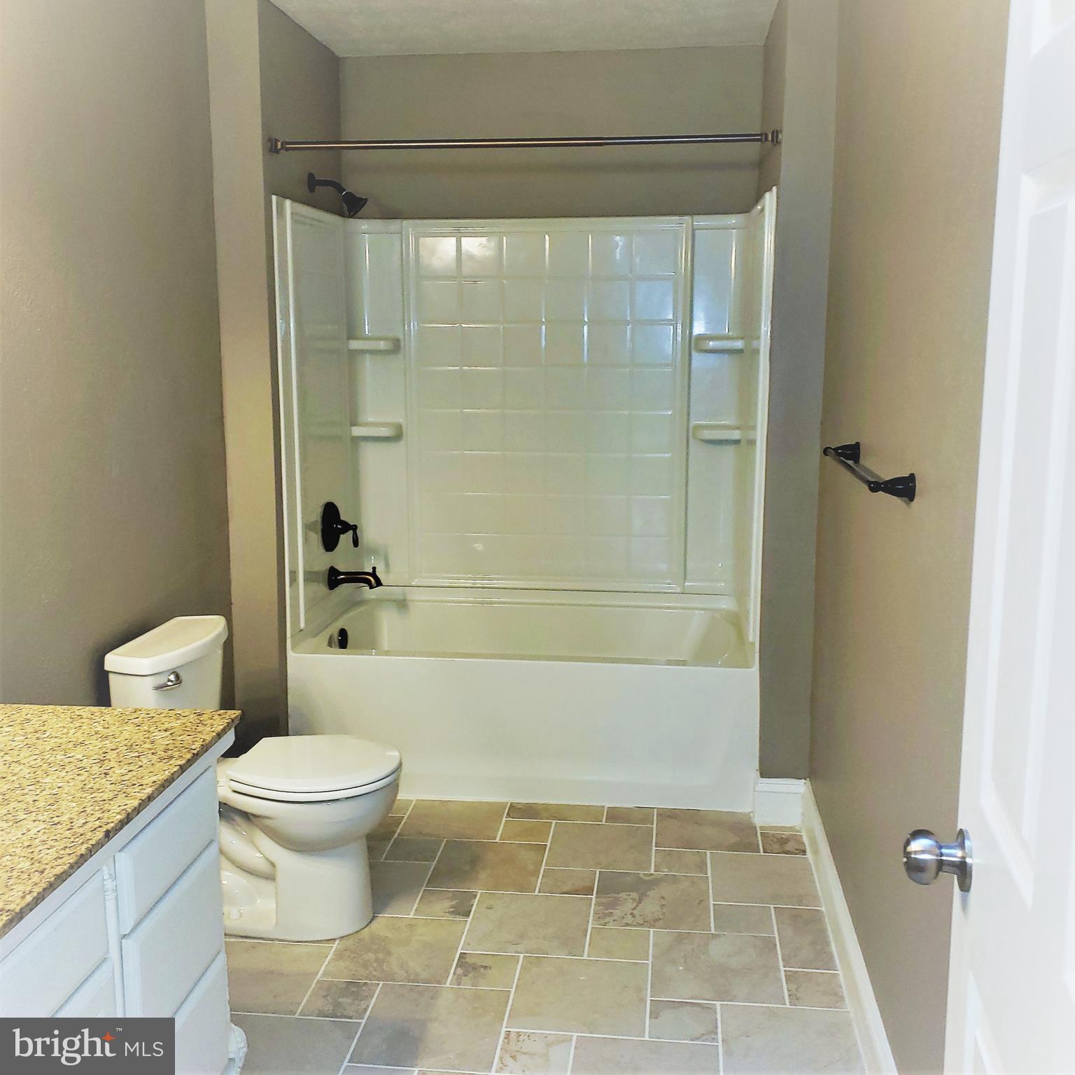 1321 Emmanuel Church Road Huntingtown, MD 20639 - Photo 19 of 30 Upstairs bath, Ceramic Tile, Custom Vanity