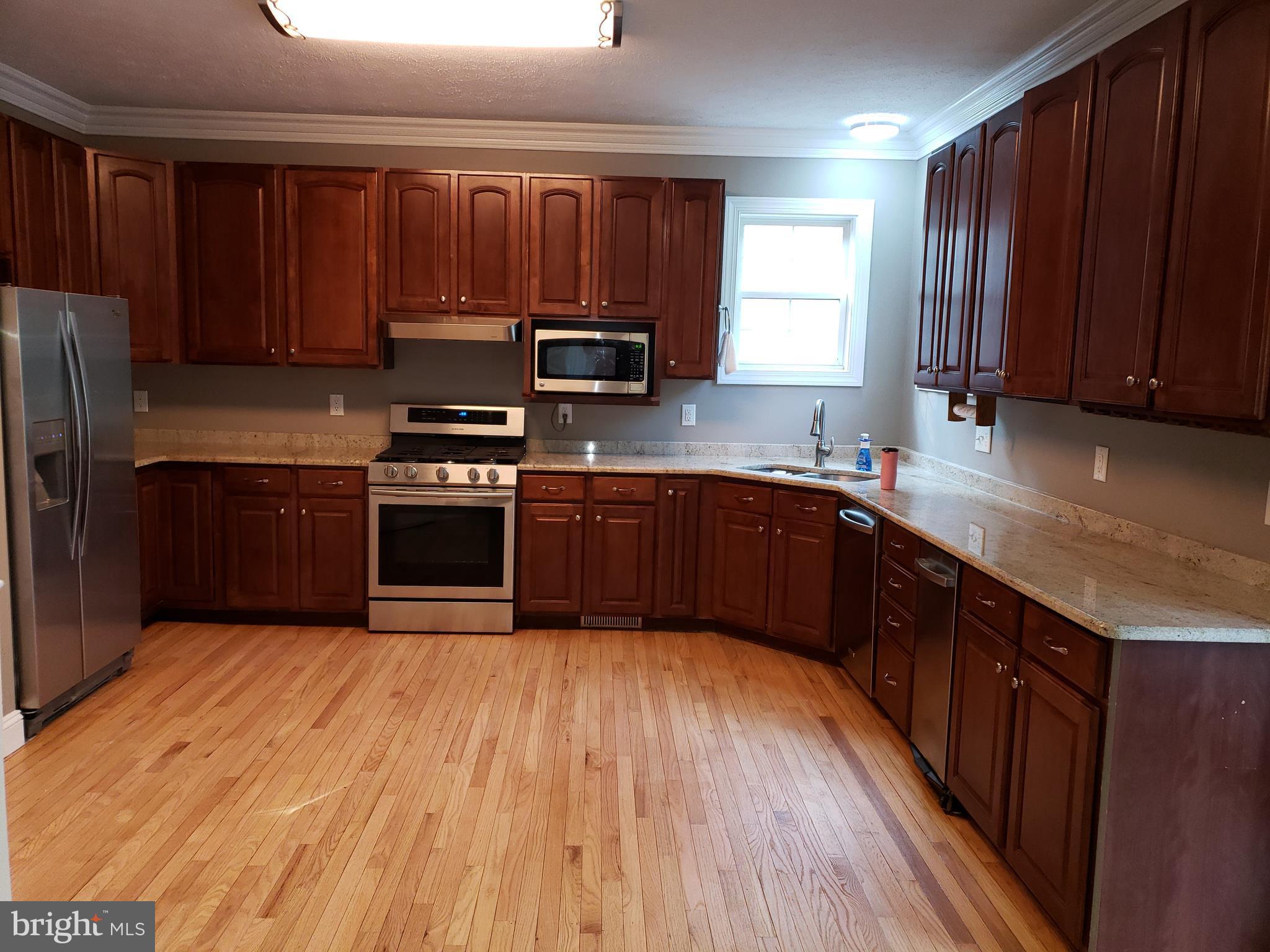 1321 Emmanuel Church Road Huntingtown, MD 20639 - Photo 6 of 30 All Granite/SS Kitchen