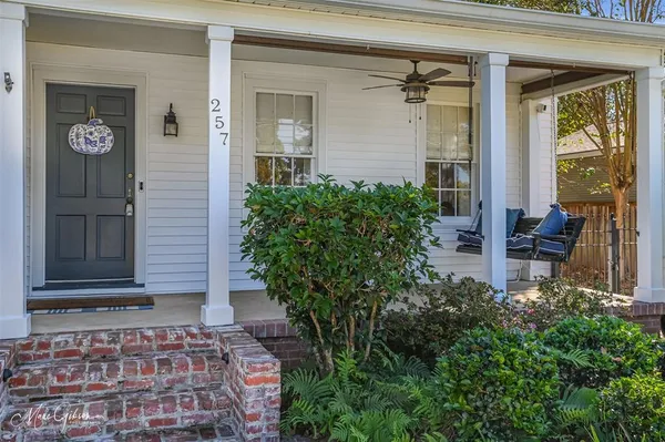 a front view of a house with a porch